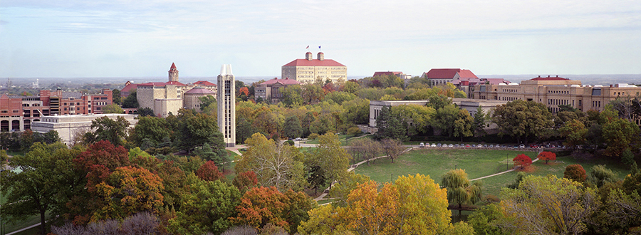 Skyline of KU campus with red roofs and autumn trees and greenspace